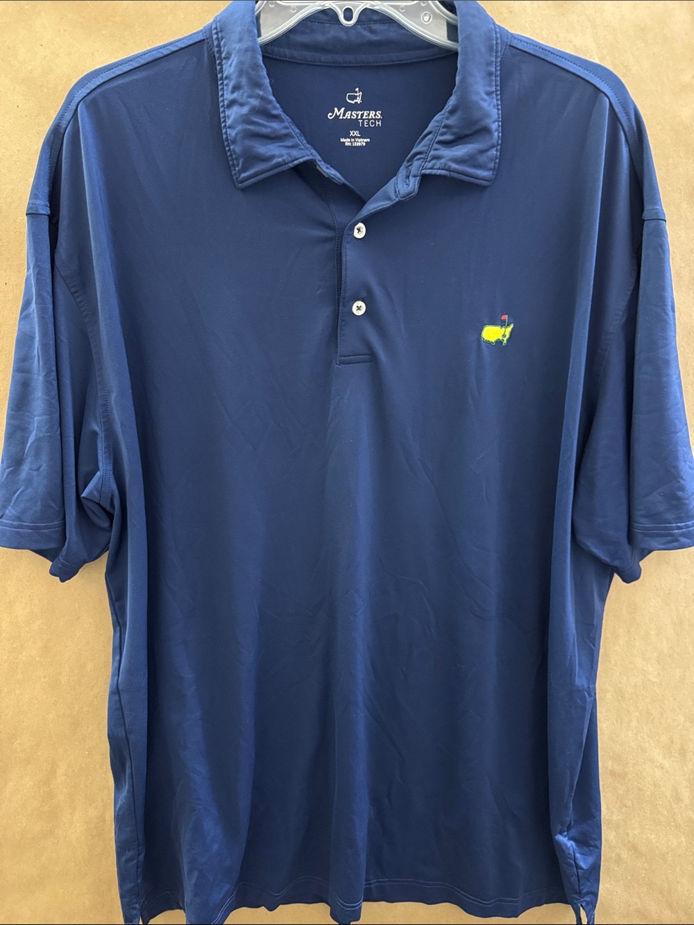 Masters Navy Polo with Yellow & Red Embroidered Logo